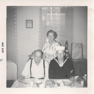 Dad with Proud Grandparents